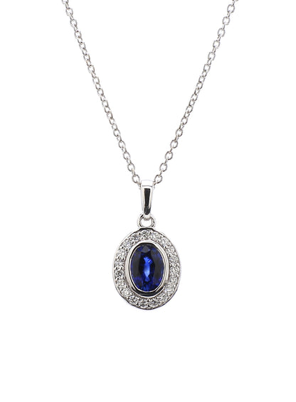 Diamond & Blue Sapphire Pendant in 18K White Gold